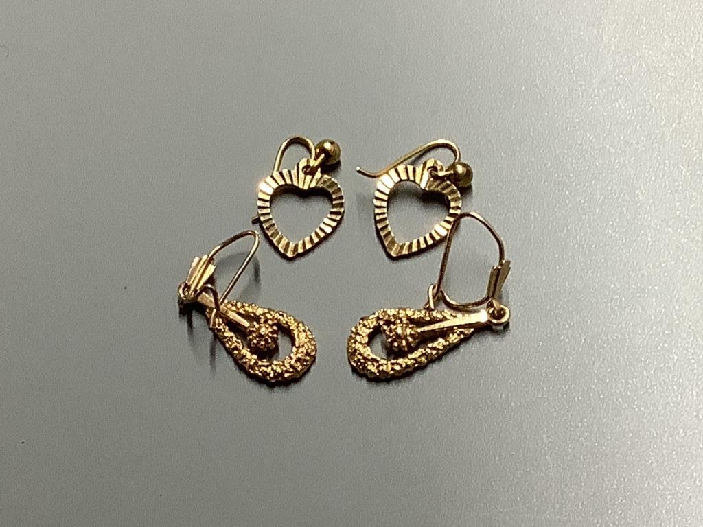 Five pairs of 9ct gold earrings, a 9ct gold tiepin and one other item, gross 9.5 grams.
